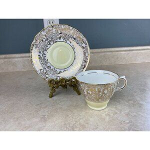 Colclough Bone China England Gold Flowered With Cream Base Tea Cup And Saucer
